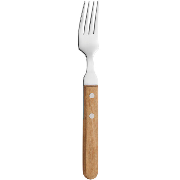 An Amefa stainless steel dinner fork with a wooden handle.