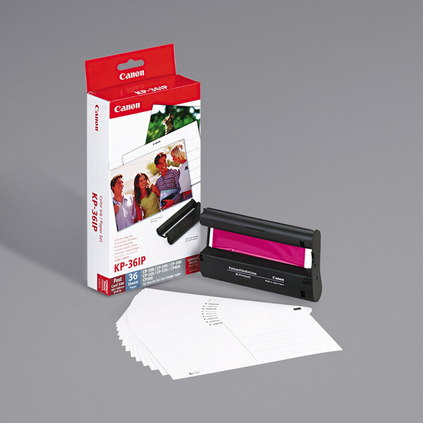 A Canon printer box with a Tri-Color ink cartridge and photo paper.