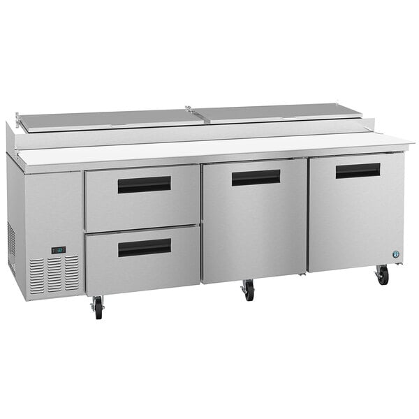 A Hoshizaki commercial refrigerator with 2 drawers and 2 doors.