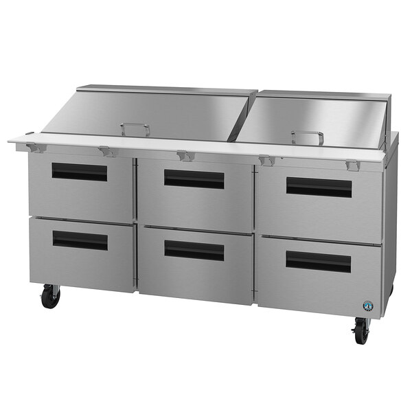 A Hoshizaki stainless steel refrigerated sandwich prep table with six drawers.