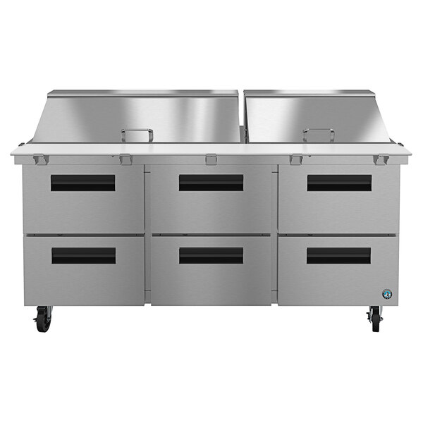 A Hoshizaki stainless steel refrigerated sandwich prep table with six drawers.