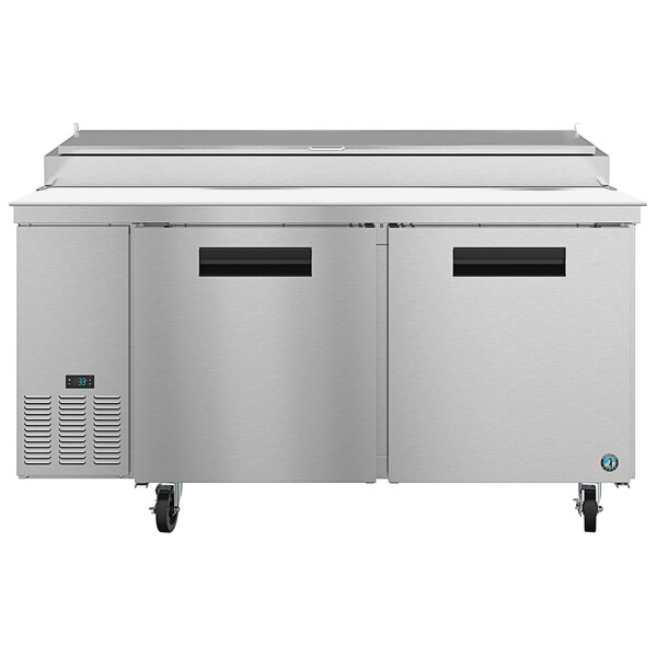 A stainless steel commercial pizza prep refrigerator with two doors.