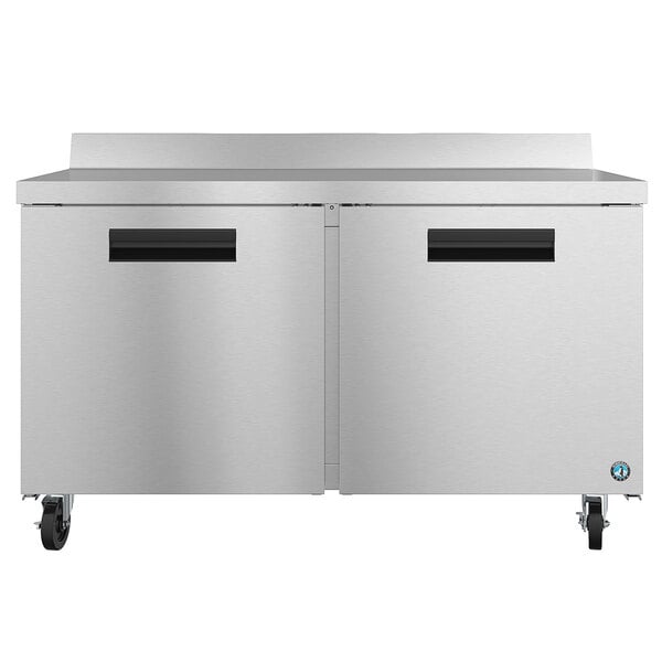 A large stainless steel Hoshizaki worktop freezer with two doors.