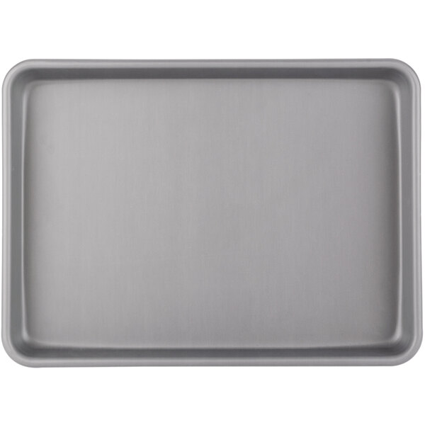 A close-up of a Merrychef HardCoat anodized sheet pan with a silver finish.