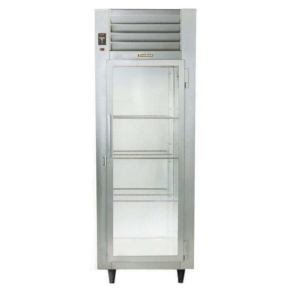 A Traulsen stainless steel holding cabinet with glass doors and shelves.