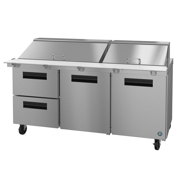 A Hoshizaki stainless steel refrigerated sandwich prep table with drawers.