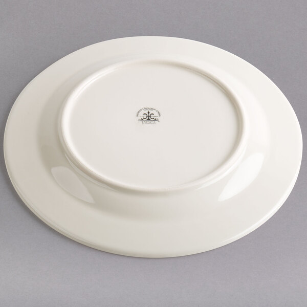 A Homer Laughlin ivory china plate with a logo on it.