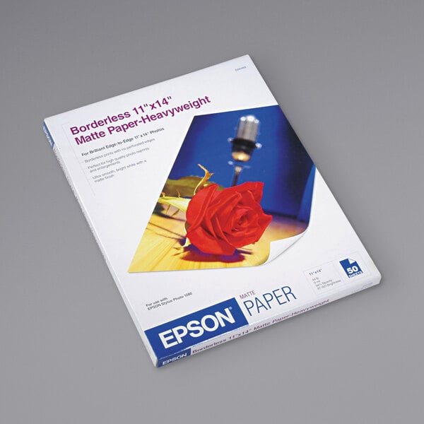 A white box of Epson Bright White Premium Matte Presentation Paper with red text.