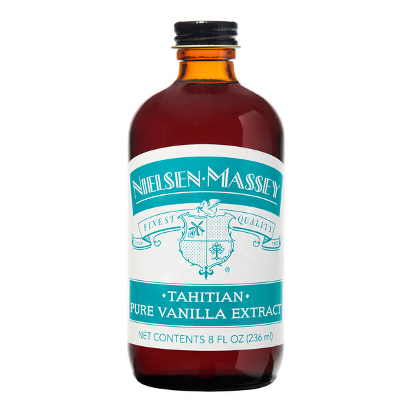 A close-up of a Nielsen-Massey 8 fl. oz. bottle of Tahitian Vanilla Extract with a label.