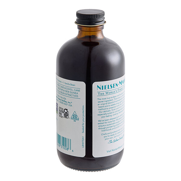 A bottle of Nielsen-Massey Tahitian Vanilla Extract with a label.