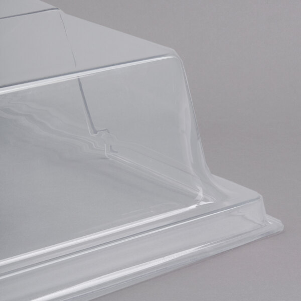 A clear plastic Cal-Mil rectangular bakery tray cover with long hinge.