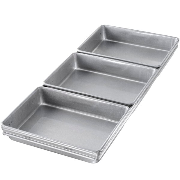 A Chicago Metallic 3-Strap Aluminized Steel Cinnamon Roll Pan Set.
