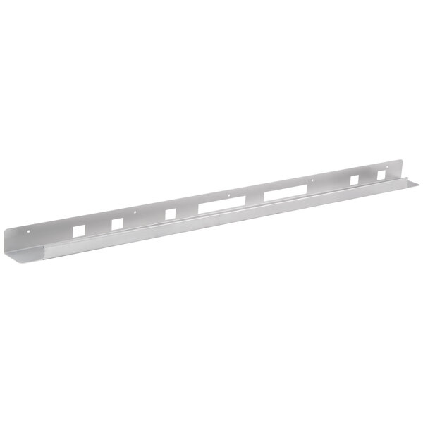 A white metal shelf with holes and a metal bar.