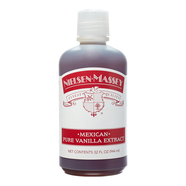 A 32 fl. oz. bottle of Nielsen-Massey Mexican Vanilla Extract with a white label.