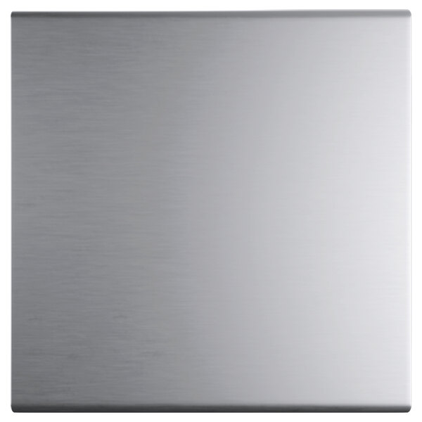 A close-up of a silver square metal surface.