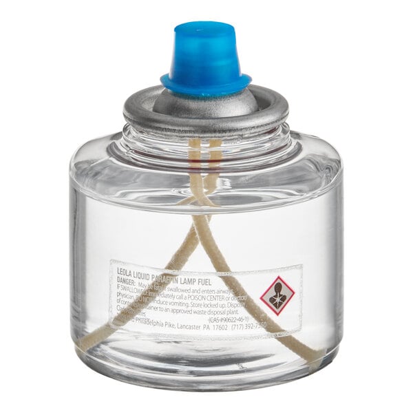 A clear liquid candle fuel cartridge with a blue cap and visible wick, intended for commercial use.