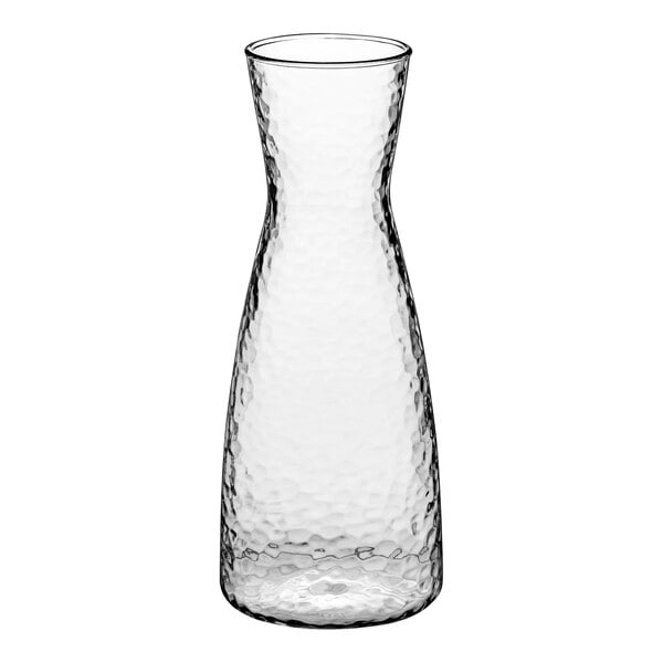 A clear plastic carafe with a curved neck.