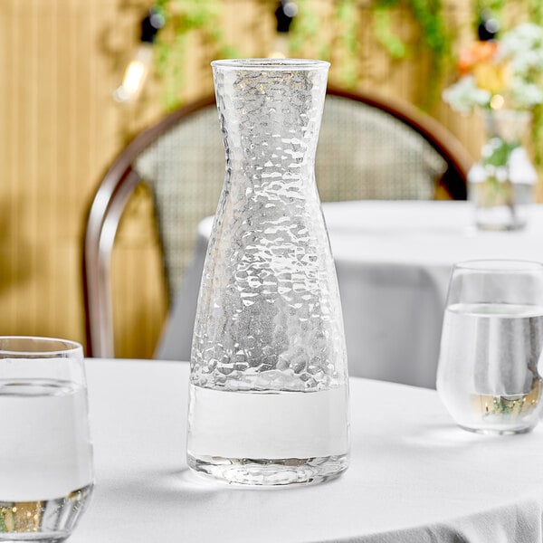 Front of the House ACF003CLT22 Drinkwise 38 oz. Hammered Design Plastic  Carafe