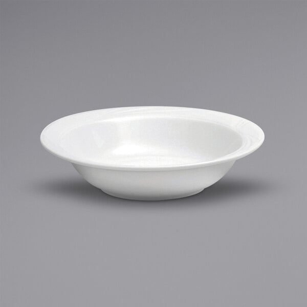 a white bowl on a gray background