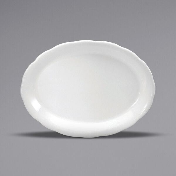 A white Oneida Buffalo Caprice oval platter with a scalloped edge.