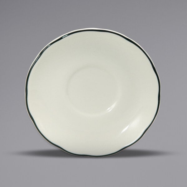 A white Oneida Buffalo Caprice saucer with a scalloped edge and black trim.