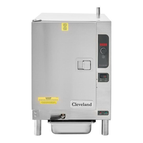 A large stainless steel Cleveland countertop steamer with buttons and a tray inside.
