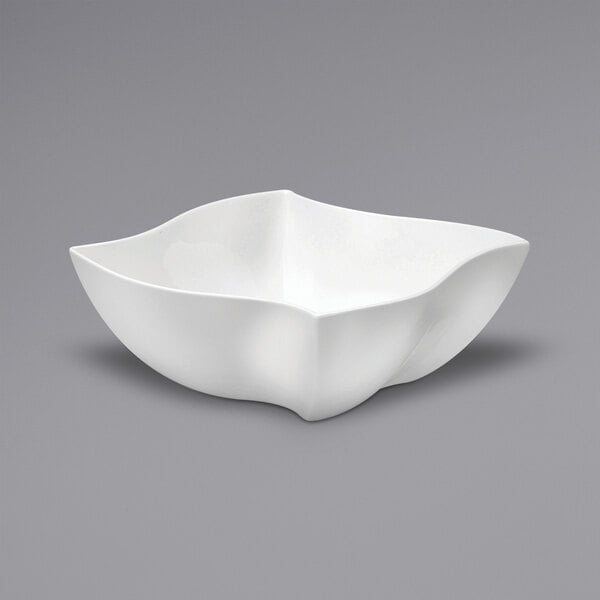 A white bowl with a curved edge.