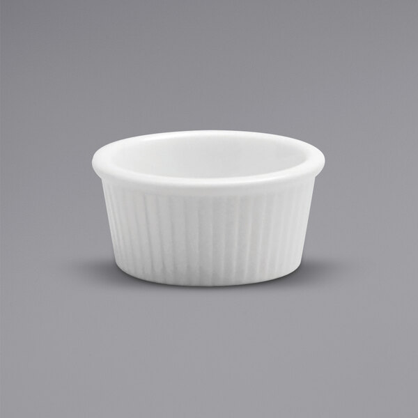 a white bowl with a handle