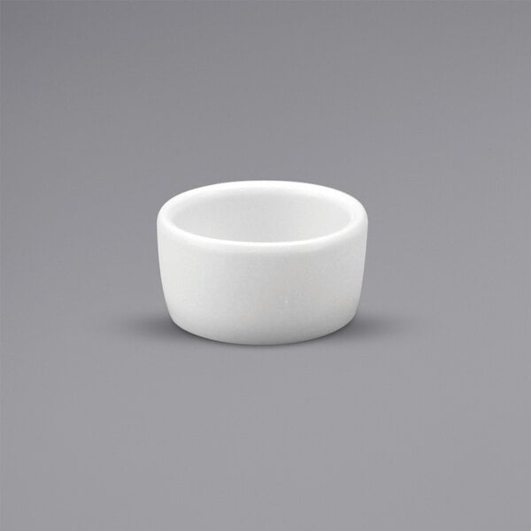 A white Oneida Buffalo porcelain ramekin.