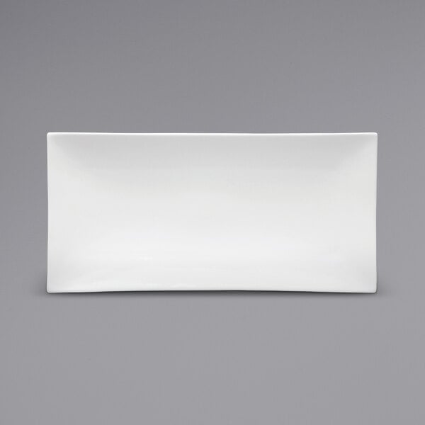 A white rectangular porcelain sushi platter with a rolled edge.