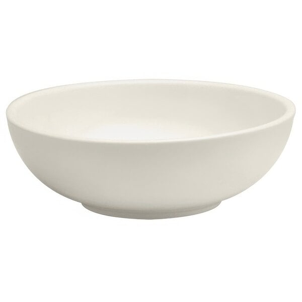 A white Oneida Buffalo porcelain pasta bowl with a rolled edge.