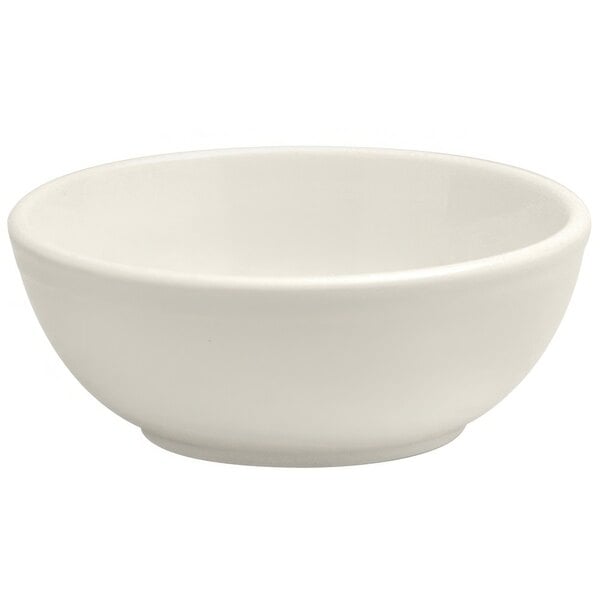 A Oneida Buffalo Cream White Ware porcelain nappie bowl with a rolled edge.