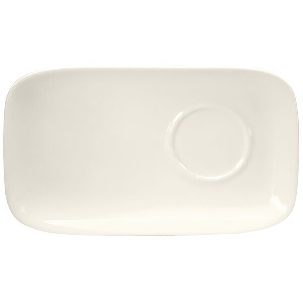 A white rectangular plate with a circle in the middle.