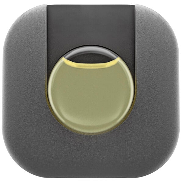 A close up of a simplehuman rectangular front step-on trash can with a black square and yellow circle.