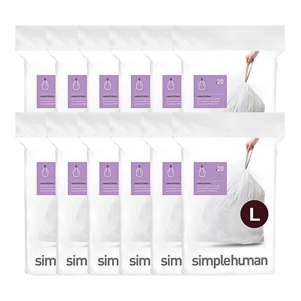 A group of white simplehuman Code L trash can liners.