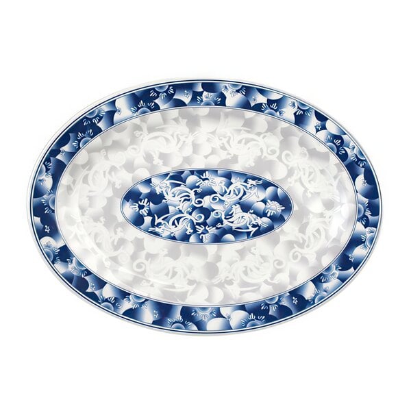 A white oval melamine platter with a blue dragon design.