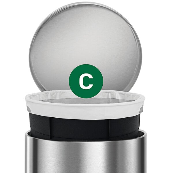 A close up of a white simplehuman trash can liner box.