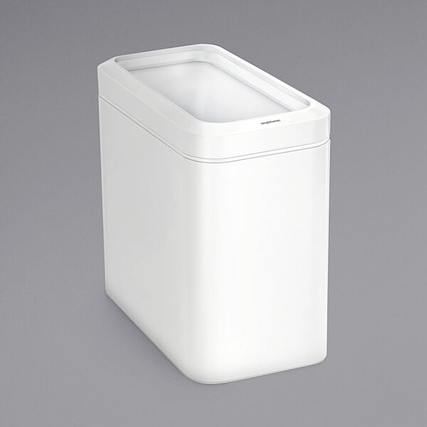 A white rectangular simplehuman open top trash can.