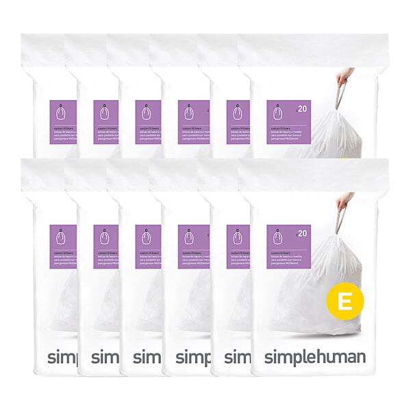 A group of 240 white plastic simplehuman trash can liners with a purple label.
