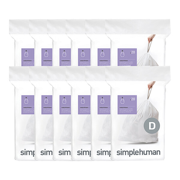 A group of 12 white simplehuman custom fit Code D trash can liners.