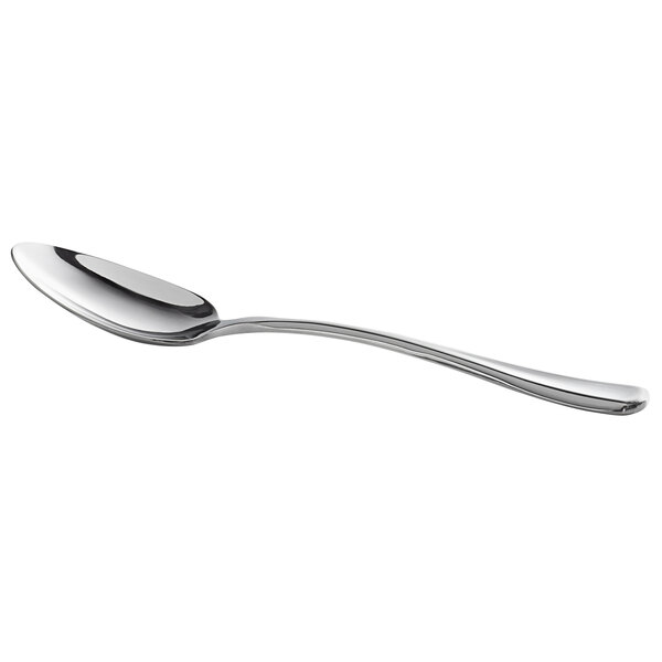 A Libbey stainless steel demitasse spoon with a silver handle.