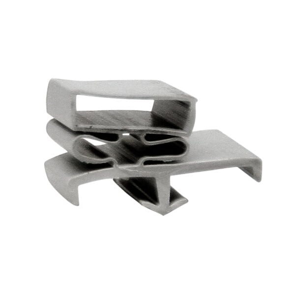 A grey plastic Continental Refrigerator drawer gasket clip.