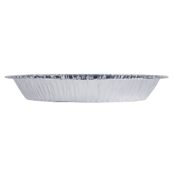 A round aluminum foil pie pan with extra depth and a silver trim on the edge.