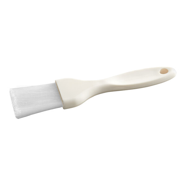 A white-handled brush with white bristles, featuring a hole at the end of the handle.