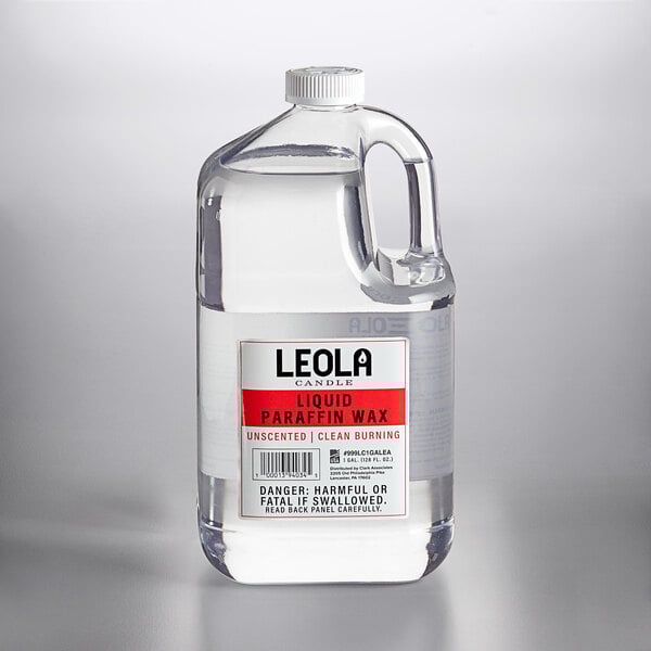 A Leola red jug of liquid wax.