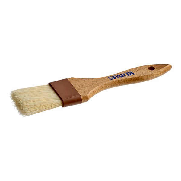 A wooden-handled pastry or basting brush with natural boar bristles and a brown ferrule.
