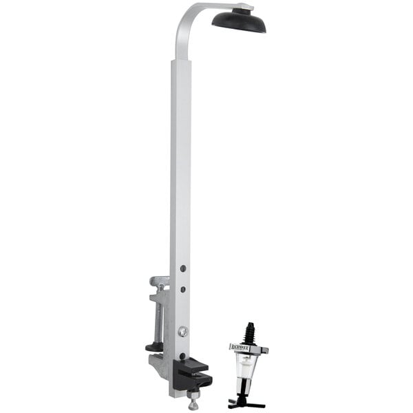 A white Precision Pours rack holding a single silver bottle pourer.