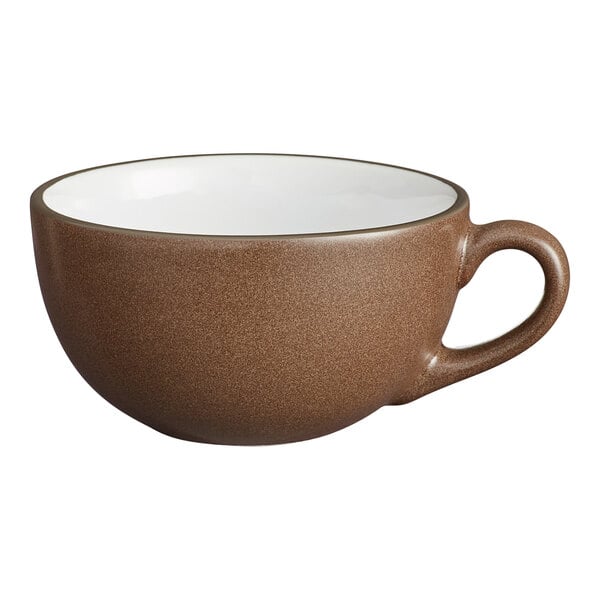 A brown matte stoneware cup with a handle and a white interior.