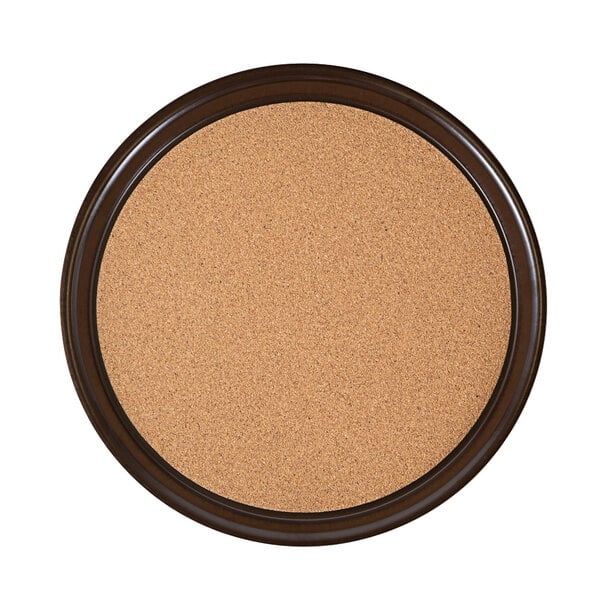 A round brown cork-lined serving tray.