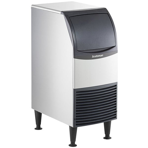 A Scotsman undercounter flake ice machine with a stainless steel base and black lid.